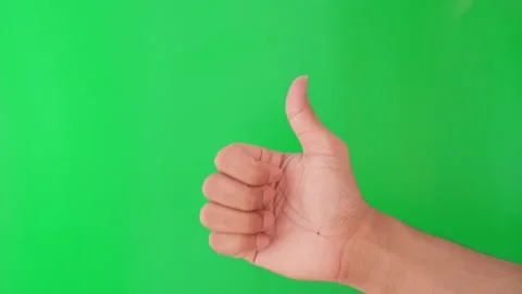 Thumbs up gesture on green background. green screen. Vidéo 305685361