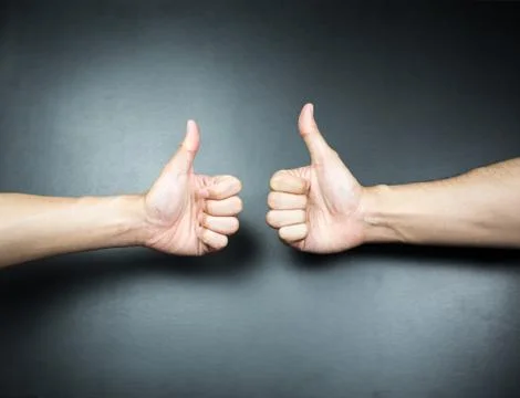 Thumbs Up hand gesture on background Stock Photos