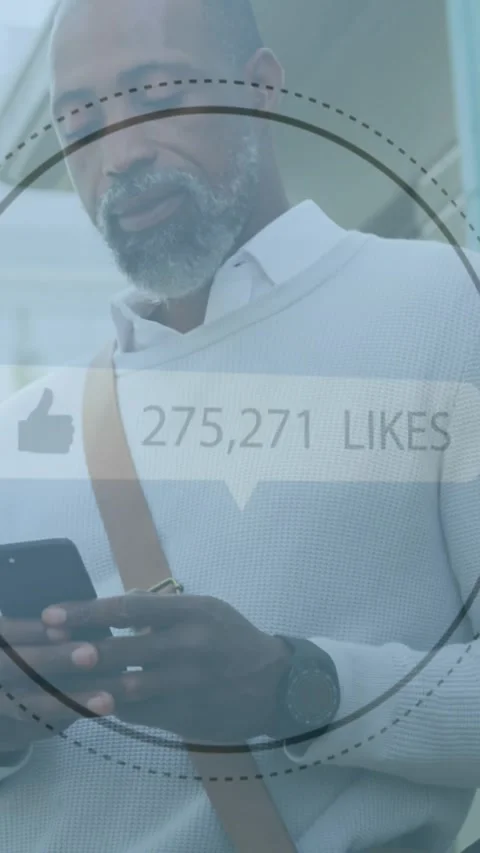 Thumbs up icon with increasing likes against african american senior man using Stock Footage 342004038