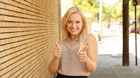 Thumbs up positive gestures from young hip woman Stock-Footage 37206840