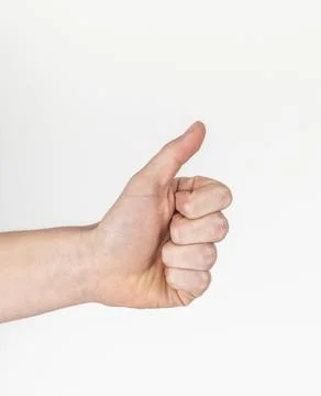 Thumbs up sign with hand Stock Photos