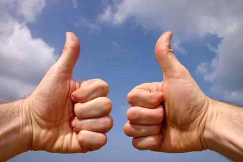 Thumbs up sign Stock Photos