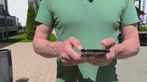 Thumbs texting, typing message on mobile phone screen. Hands holding smartp.. Stock Footage 336975238