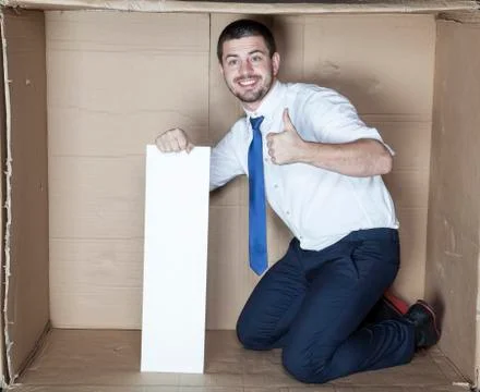 Thumbs up for work in the office Foto stock