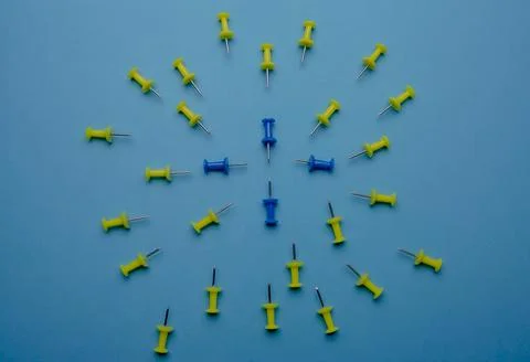 Thumbtack circle on blue background Stock Photos