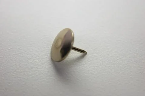 A thumbtack for sticking paper on the wall Stock Photos