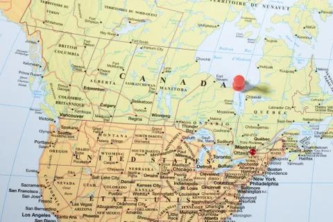 Thumbtack on world map Stock Photos