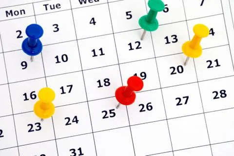 Thumbtacks on Calendar Stock Photos