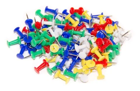 Thumbtacks on white background Stock Photos