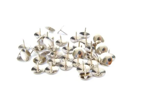 Thumbtacks on a white background Stock Photos
