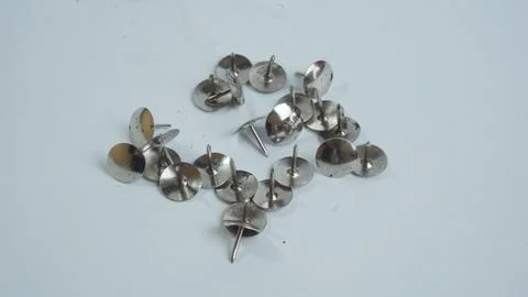 Thumbtacks on a White Background Stock Photos