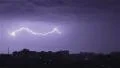 Thunder and lightning above city sky. Lightning forks to buildings, sound HD Footage