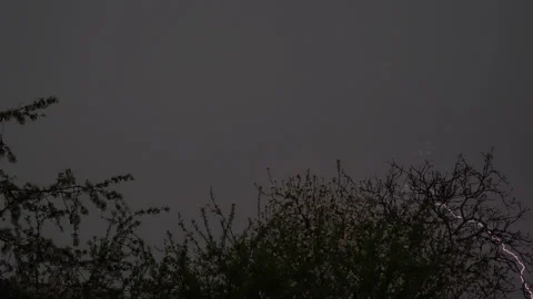 Thunder and lightning in the evening sky during the rain at springtime 動画素材 130498743