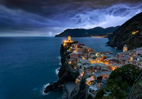 Thunder and lightning over the town of Vernazza, Cinque Terre Italy Stock Photos