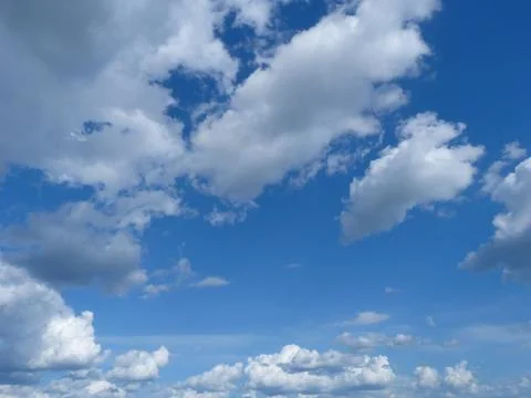 Thunder Clouds On Blue Sky Stock Photos
