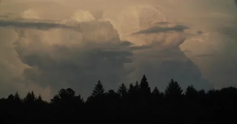 Thunder clouds form in summer at lakeside Stock Footage 238881736