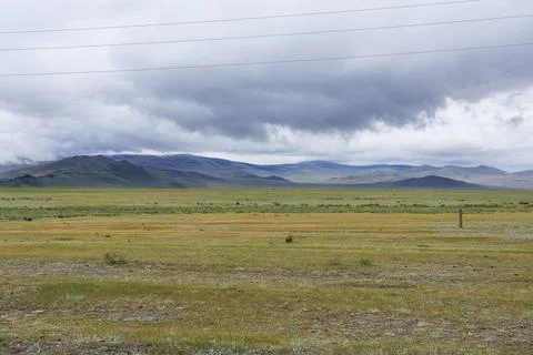 Thunder clouds on the steppe. Stock Photos