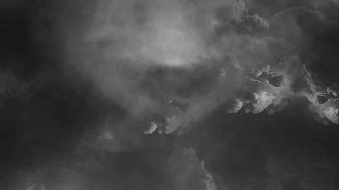 Thunder rumbled within the thick gray clouds. Stock Footage 233857755