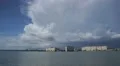 Thunder Storm Clouds On The Shoreline With High Rise Beach Resorts HD HD Footage