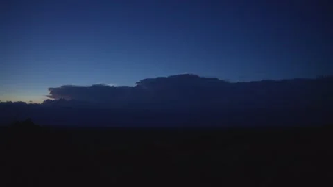 Thunder storm forming at night sky lightning strikes and shines in black clouds Stock Footage 304174240