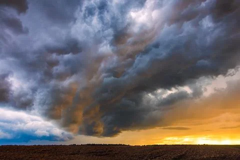 Thunder storm with shelf cloud at sunset, summer, Lithuania Stock Photos