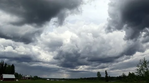 Thunder Storm Sweeps Over Village Meadow in Arctic Lapland Summer Stock Footage 234552154