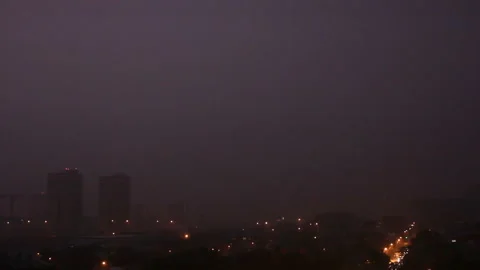 Thunderbolt and lightning in evening town Stock Footage 150542346