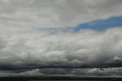 Thunderclouds above the ground Stock Photos