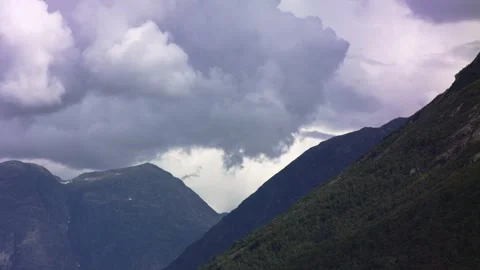 Thunderclouds forming over mountains in Norway. Stock Footage 245489647
