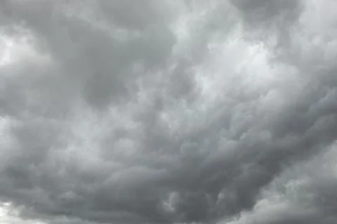 Thunderclouds. Grey sky. Summer clouds. Beautiful weather. Stock Photos