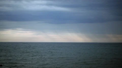 Thunderclouds hang over the stormy sea. Stock Footage 162211608