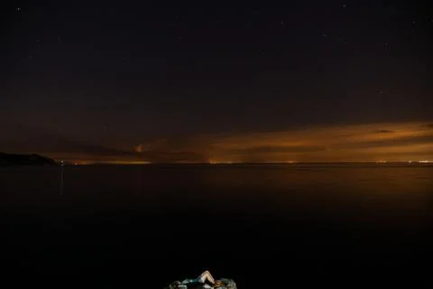 Thunderclouds at night with lightning Stock Photos