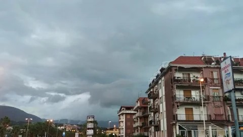 Thunderclouds Over the City. A Storm is Approaching on the Coast of Calabria. Stock Footage 220664863