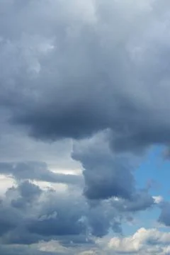 Thunderclouds over horizon, cloudscape, storm. Cloudy sky background. Stock Photos
