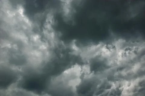 Thunderclouds in stormy sky, dark gray cloudscape before rain Stock-Fotos