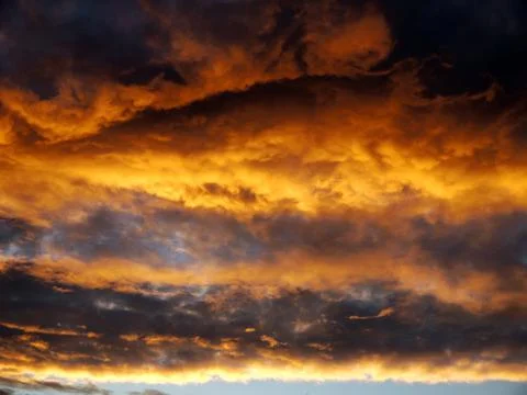 Thunderclouds. Sunset before a night thunderstorm with rain. The concept of n Stock Photos
