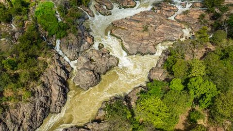The thundering rapids of Li Phi Waterfall cut across the Mekong River, creati Stock Photos