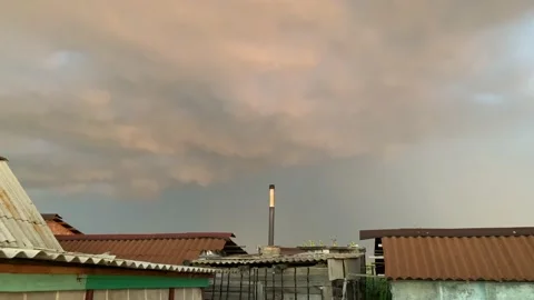 Thunderous sky with thunder and lightning in the evening at sunset Stock Footage 145731407