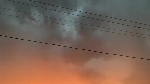 Thunderous sky with thunder and lightning in the evening at sunset Stock Footage 145731427