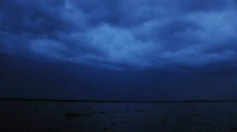 Thunderstorm and lightning over lake in the night Stock Footage 497844