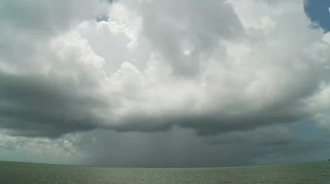 A Thunderstorm approaches over the sea Stock Footage