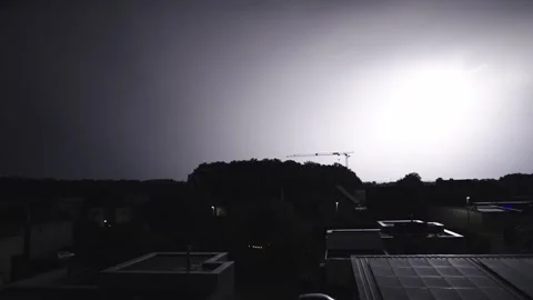 Thunderstorm bolts from the sky while driving along at a rainy day with dark Stock Footage 287468256