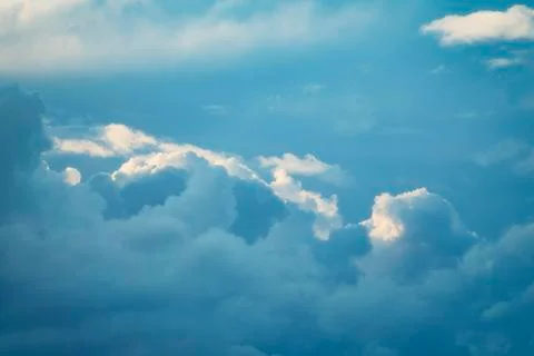 Thunderstorm cloud in the sky at sunset texture background. Stock Photos
