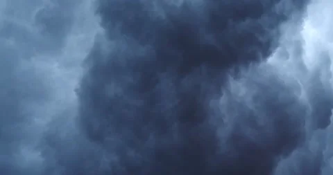 Thunderstorm clouds growing larger in the sky dark and black Stock Footage 205448202