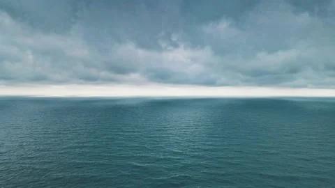 Thunderstorm clouds hanging over the ocean Stock Footage 148482305