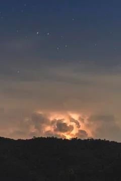 Thunderstorm Clouds with Lightning Фото