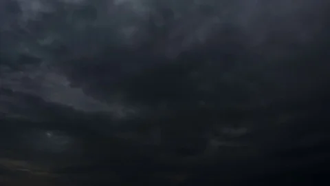 Thunderstorm clouds at night with lightning. 4K Timelapse Loop. Stock Footage 82880230