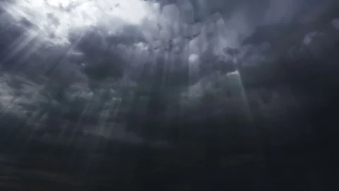 Thunderstorm clouds at night with sun rays. 4K Timelapse Loop. Stock Footage 82879815