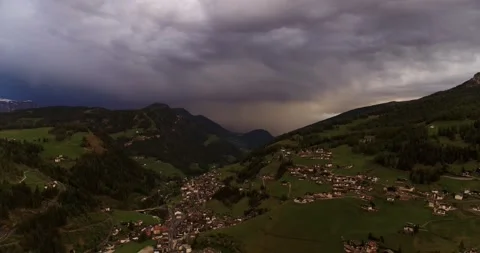 Thunderstorm clouds over Val Gardena in South Tyrol. Aerial dramatic view Stock Footage 132117454