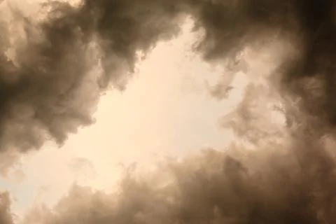 Thunderstorm clouds in pale light Stock Photos